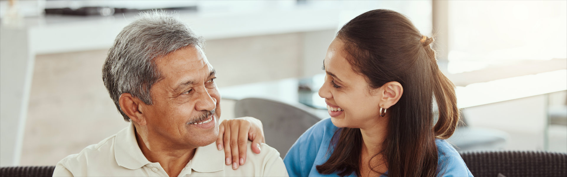 Elderly man with trust in woman in old age home